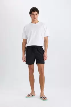 Short de bain court avec doublure filet