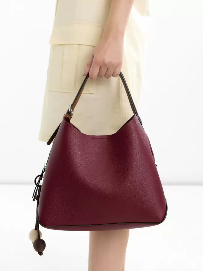 Handbag with strap
