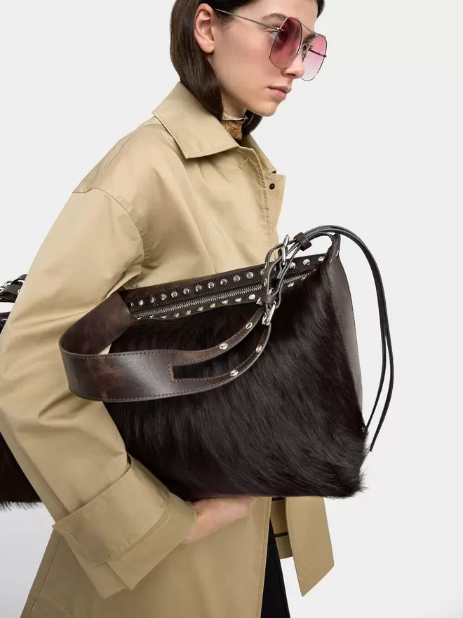 Bag with leather and studs details