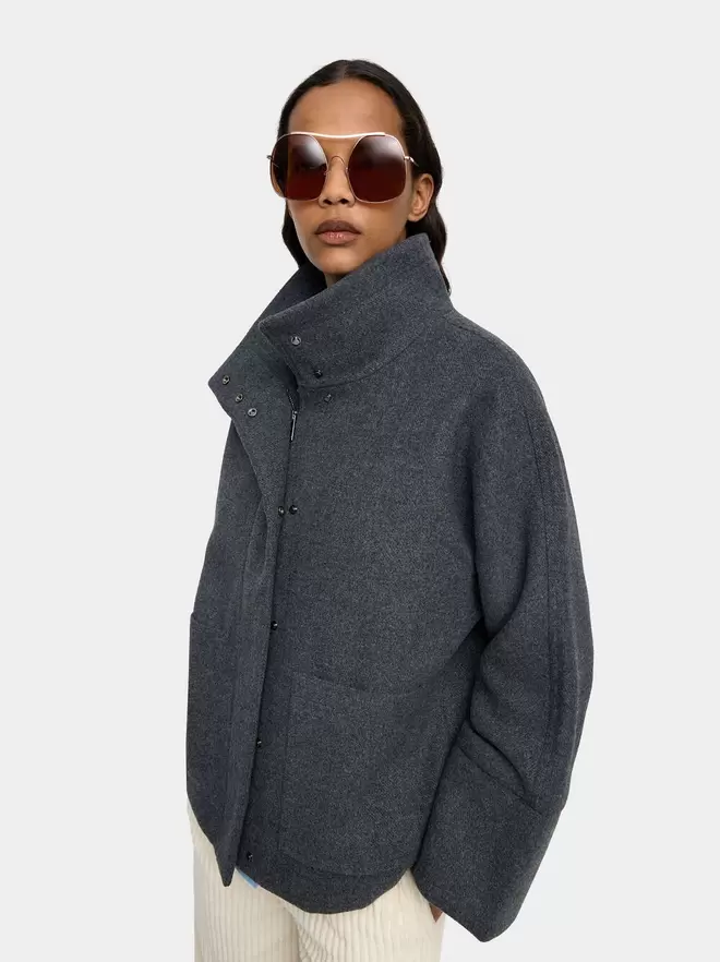 Jacket with high collar