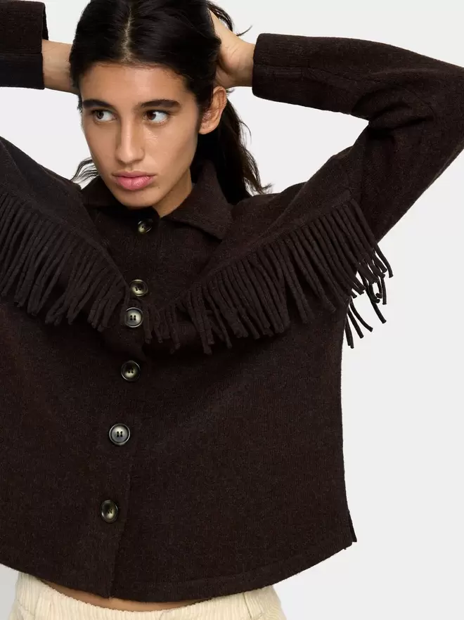 Knit cardigan with fringes