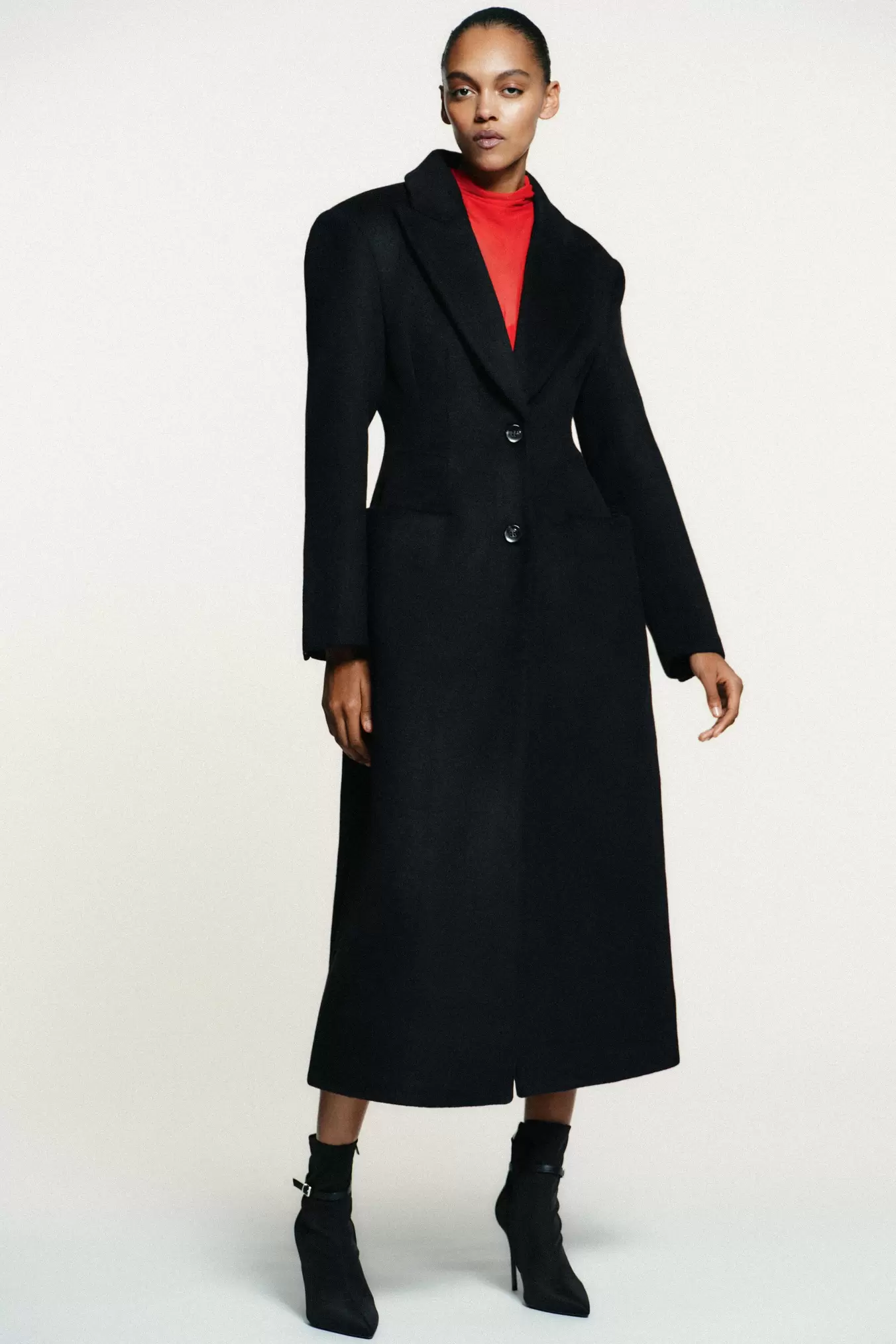 BOTTINES À TALONS AVEC BOUCLE