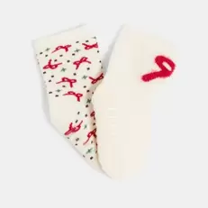 Chaussettes blanches à motif bébé fille