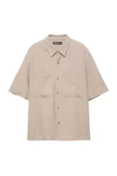 Chemise manches courtes poches