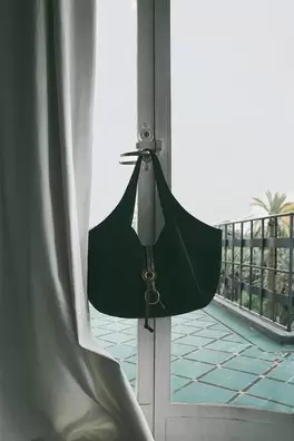 Faux suede shoulder bag with detail