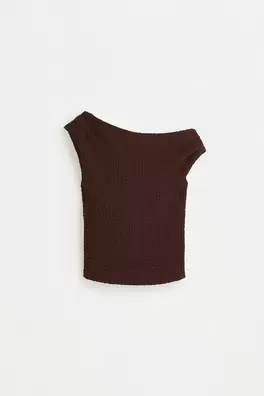 Asymmetric textured top