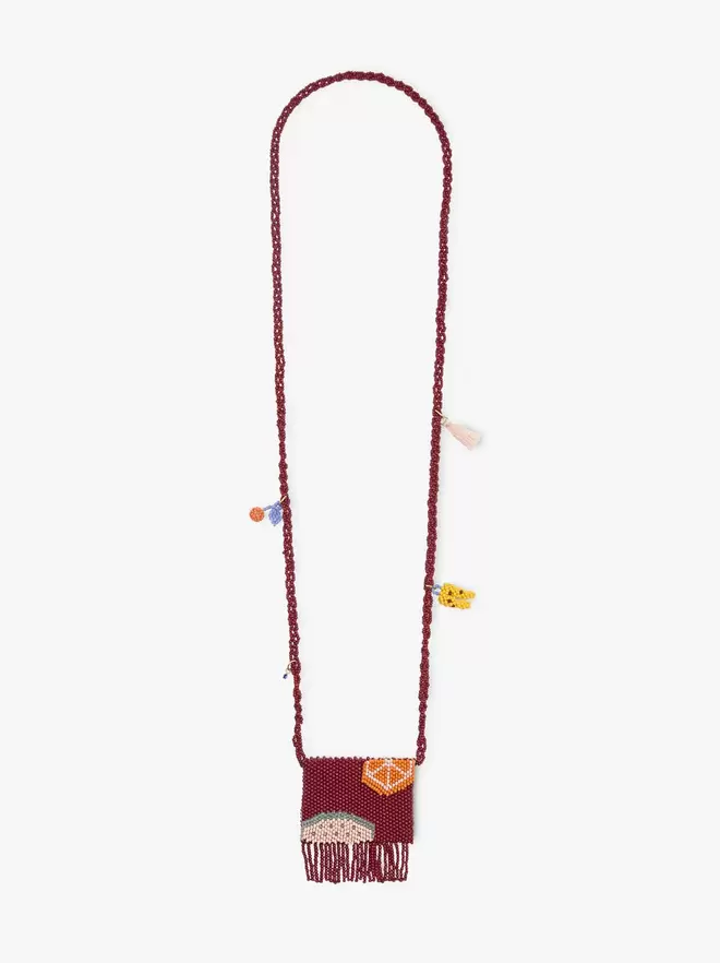 Collier long de perles de verre avec poche