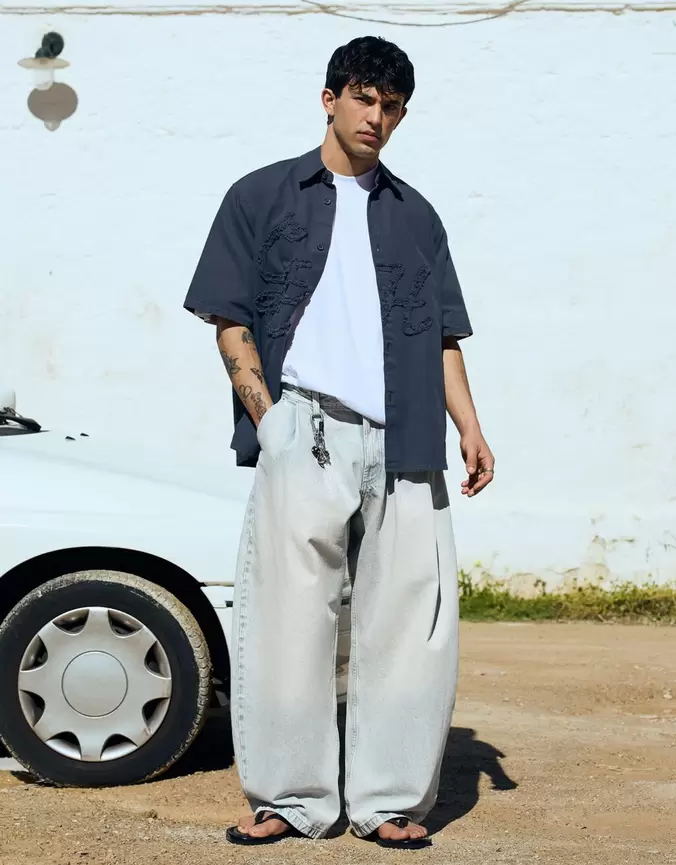 Jeans barrel à plis