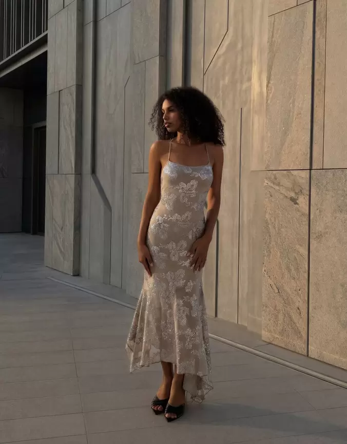 Robe midi drapée à paillettes
