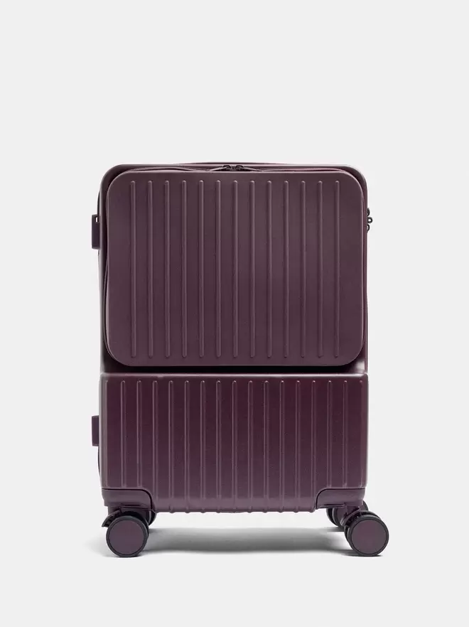 Valise de voyage rigide à texture rayée