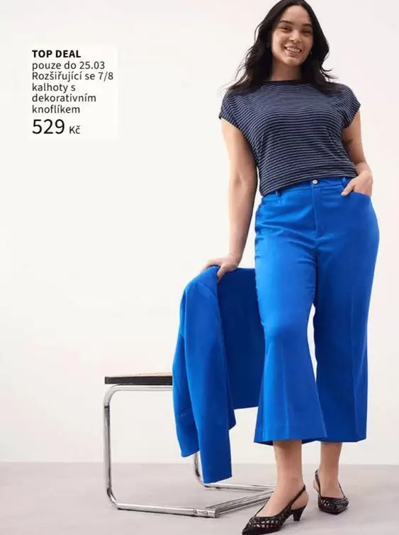 Rozšiřující kalhoty s dekorativním knoflíkem