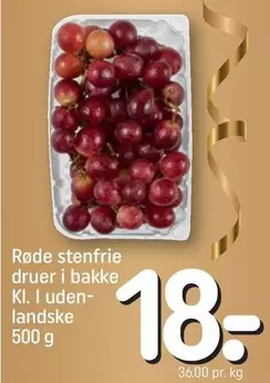 Røde stenfrie druer i bakke