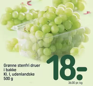 Grønne stenfri druer i bakke