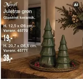 Keramik - Juletre grøn Glaseret keramik. H. 12,5 x Ø6 cm. Varenr. 45770 / H. 20,7 x Ø8,6 cm. Varenr. 45771