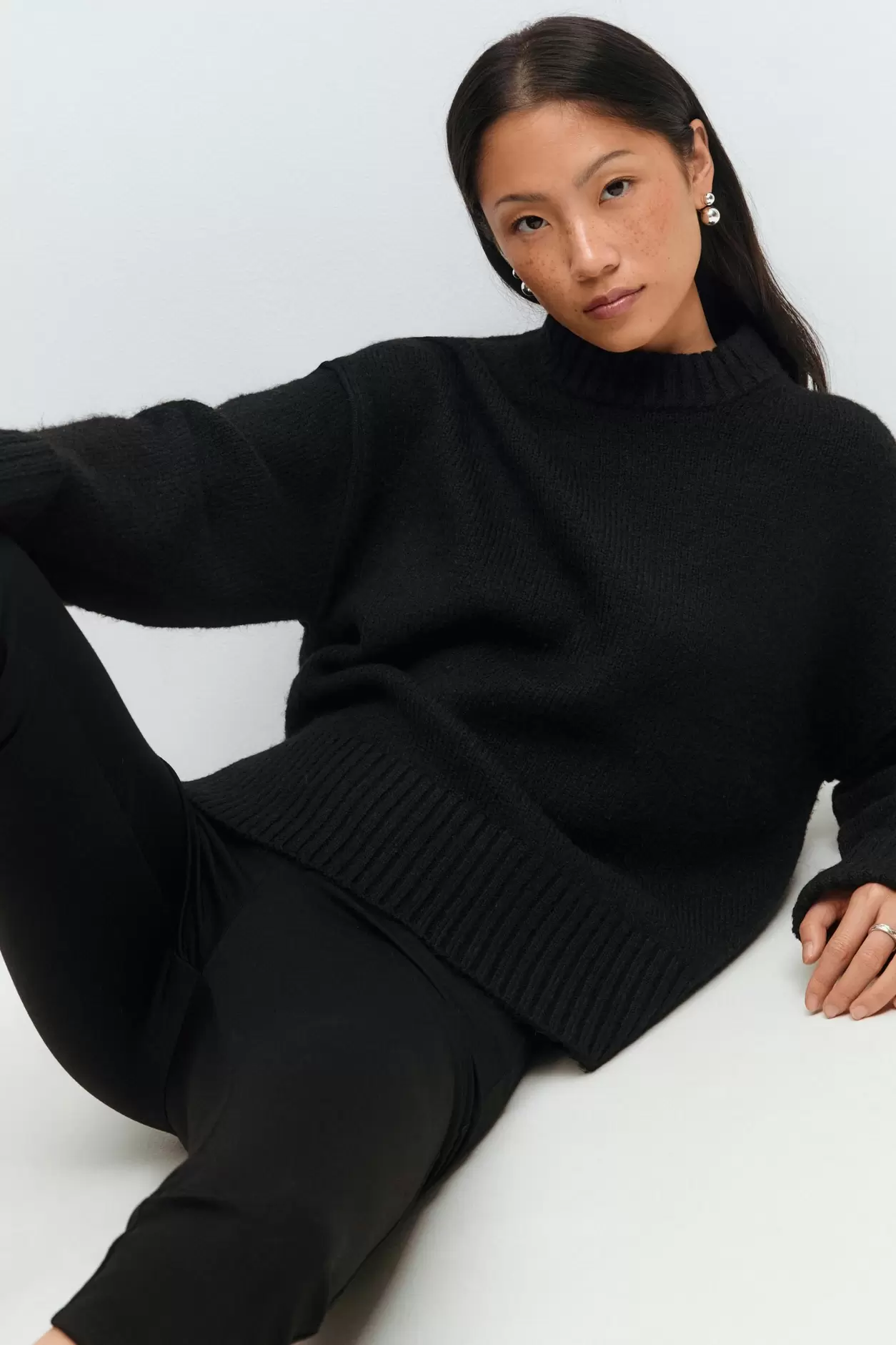 Folded sleeve knitted sweater
