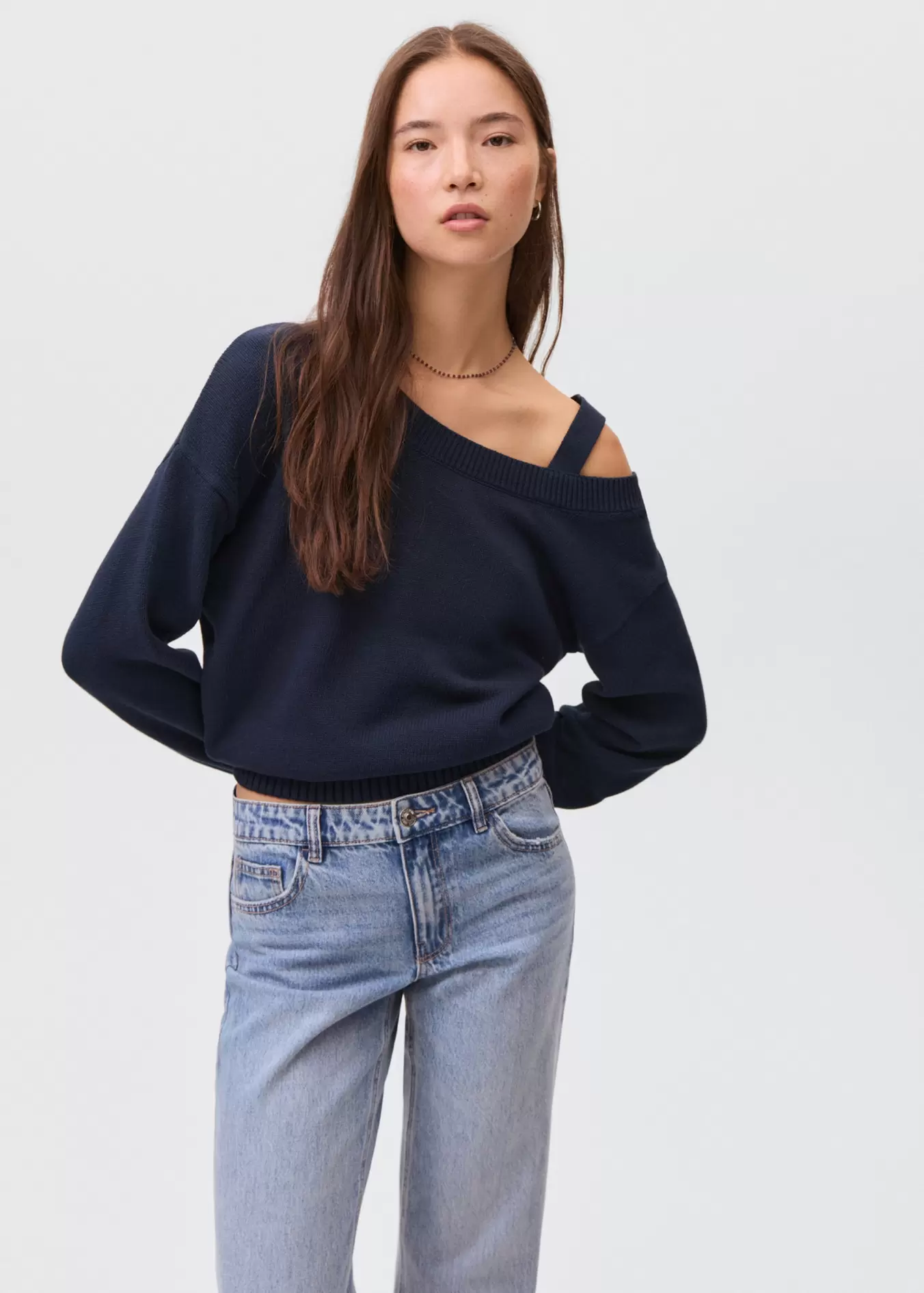 Knitted sweater with cut-out