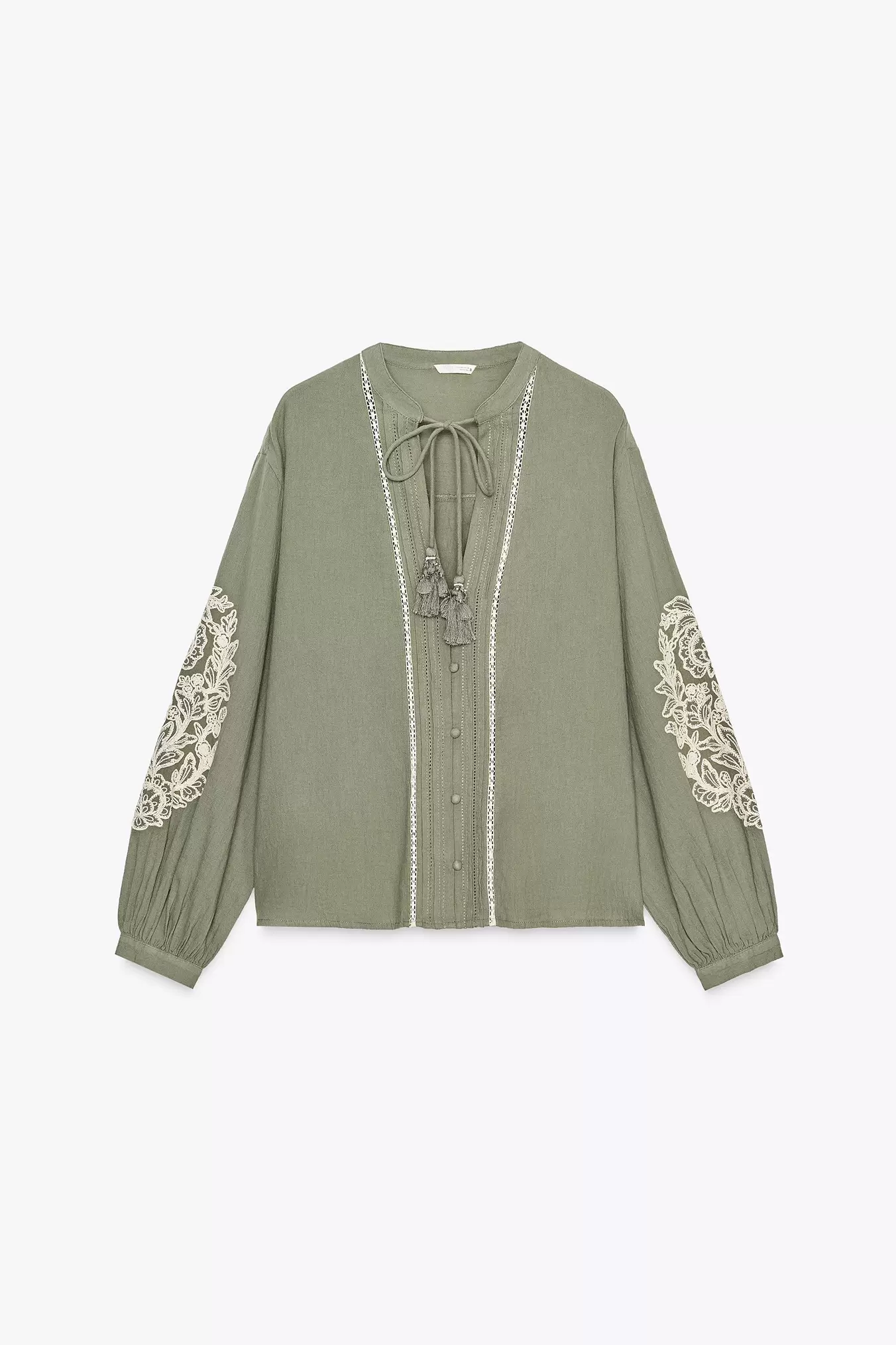 BLUSE MED KONTRASTBRODERI