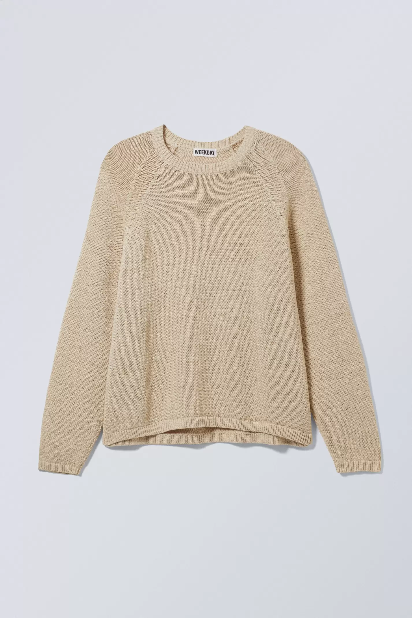 RELAXED RAGLAN-SLEEVED KNITTED SWEATER490 DKK220 DKK