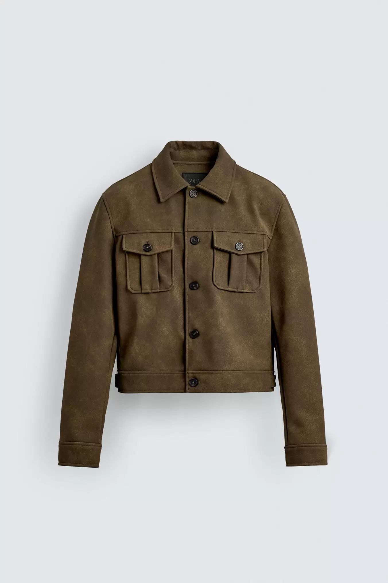 KORT JAKKE I IMITERET SKIND