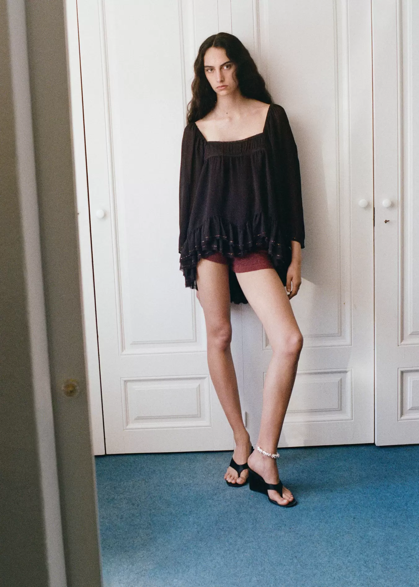 Ruffled blouse with bead embellishments