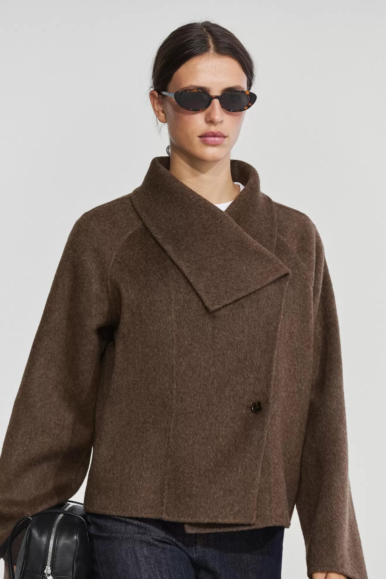 Short wool blend coat with side fastening
