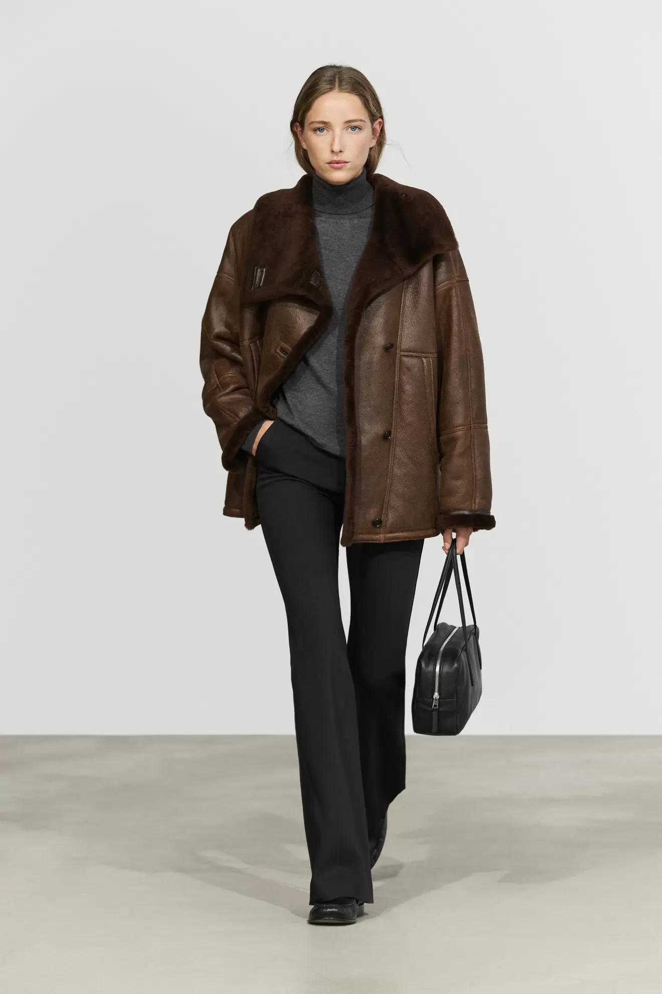 Double-faced leather coat with fur