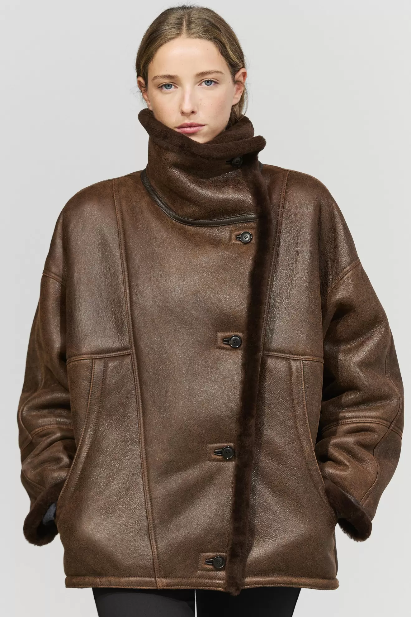 Double-faced leather coat with fur