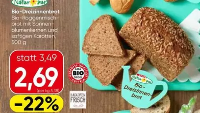 Bio - -Dinkelbrot -Roggenmischbrot mit Sonnenblumenkernen und saftigen Karotten
