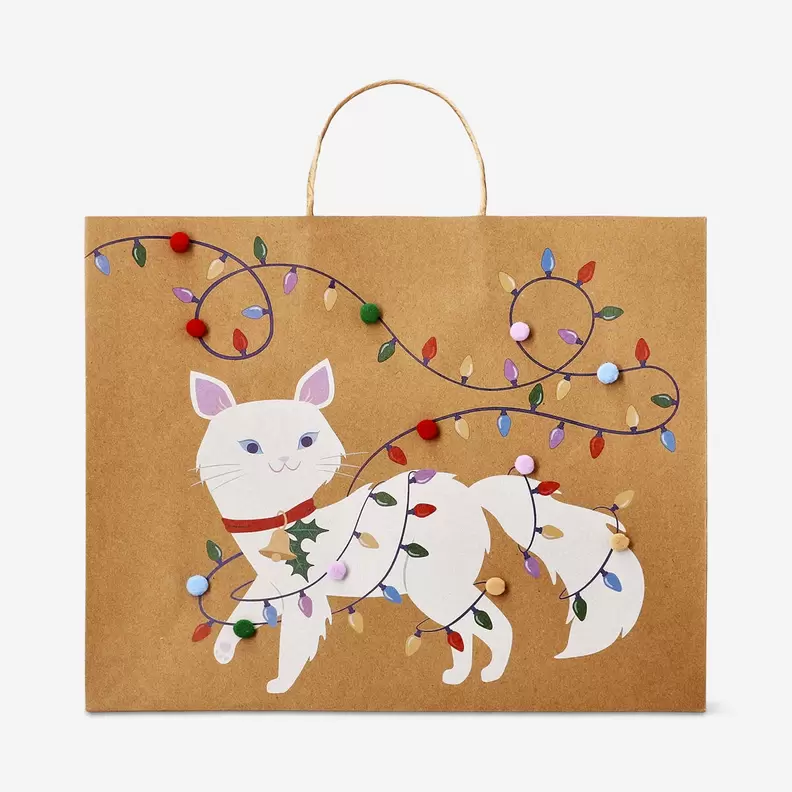 Geschenktüte mit Pom Poms