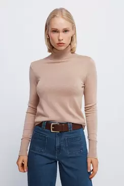 High neck jumper with buttons and cuffs