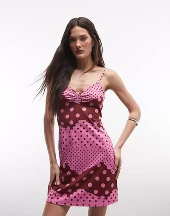 Reclaimed Vintage – Minikleid in Rosa mit Polka Dots im Patchworkdesign