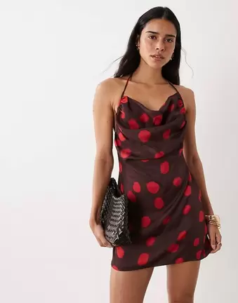 ASOS DESIGN Mini-Kleid mit tiefem Wasserfallausschnitt, Neckholder und Punktemuster
