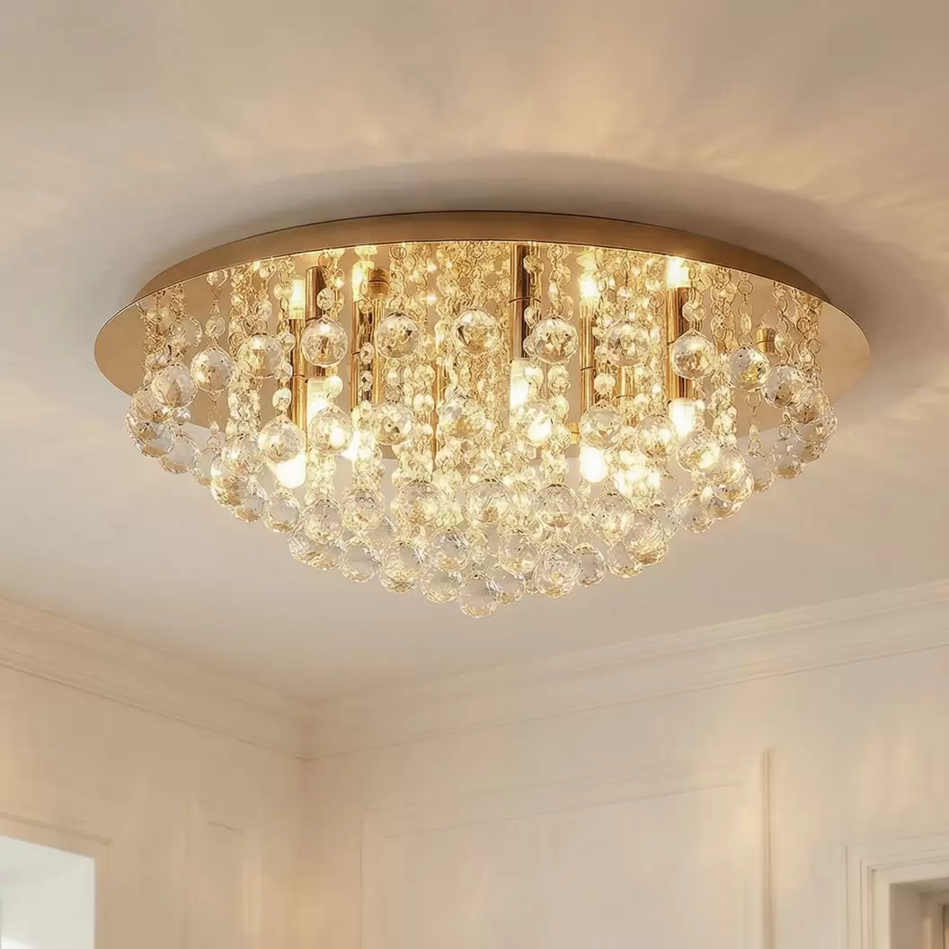 Lindby Deckenleuchte Gillion, 8-flg., gold, Kristall, Ø 55cm