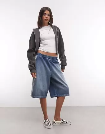COLLUSION Baggy-Denim-Shorts mit Seitenstreifen-Detail in mittlerer blauer Waschung