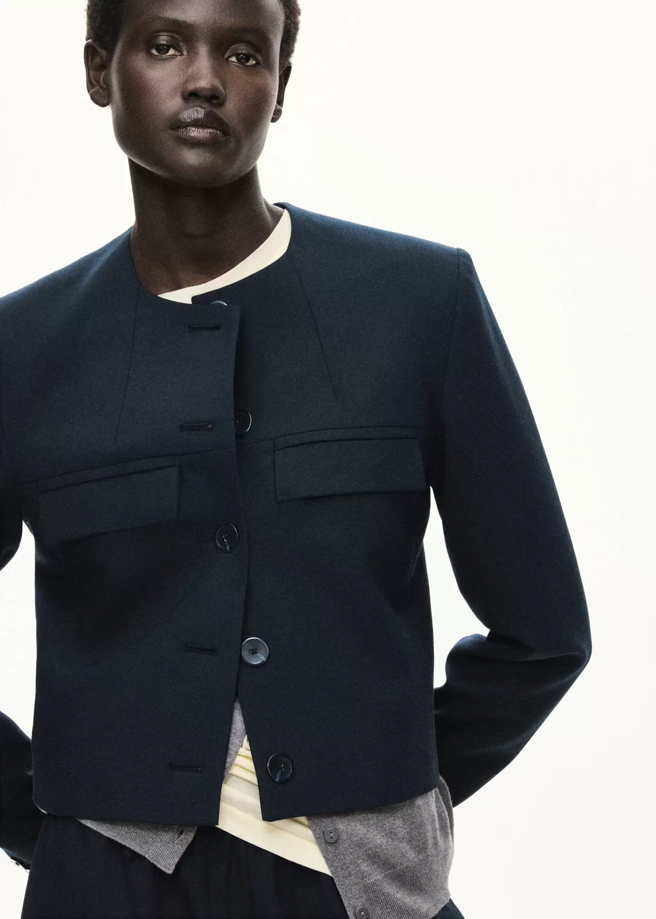 Straight jacket with flap pockets