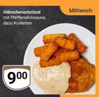 Hähnchenschnitzel mit Pfefferrahmsoße, dazu Kroketten