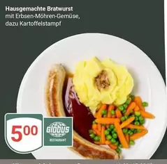 Hausgemachte Bratwurst mit Erbsen-Möhren-Gemüse, dazu Kartoffelstampf