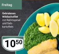 Gebratenes Wildlachfilet mit Rahmspinat und Salzkartoffeln