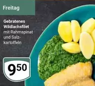 Gebratenes Wildlachfilet mit Rahmspinat und Salzkartoffeln