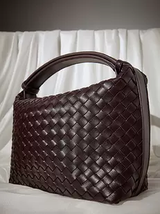 Handbag leather effect braided