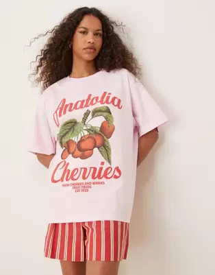 ASOS DESIGN oversized t-shirt with anatolia cherries graphic in pink