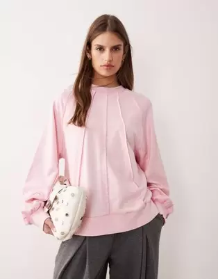 ASOS DESIGN seamed sweatshirt with panel detail in washed pink