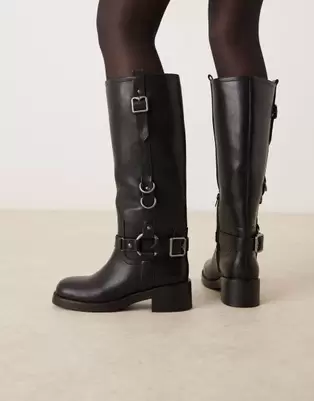 ASOS DESIGN Cobra buckle harness knee boots with silver hardware in black