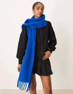 ASOS DESIGN woven fluffy tassel scarf in cobalt blue