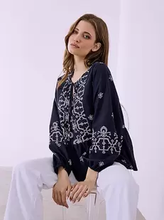 Μπλούζα με βολάν στο τελείωμα