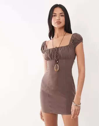 The Frolic exclusive linen feel ruched bust cap sleeve mini dress in chocolate