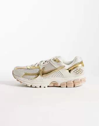 Nike Zoom Vomero 5 trainers in metallic gold