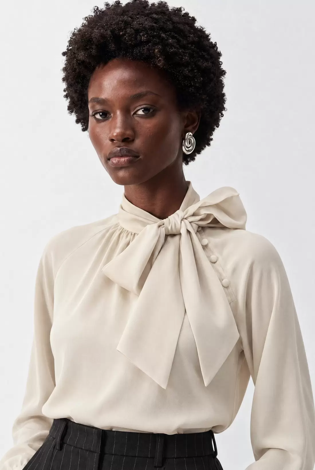 Blouse with neck tie detail