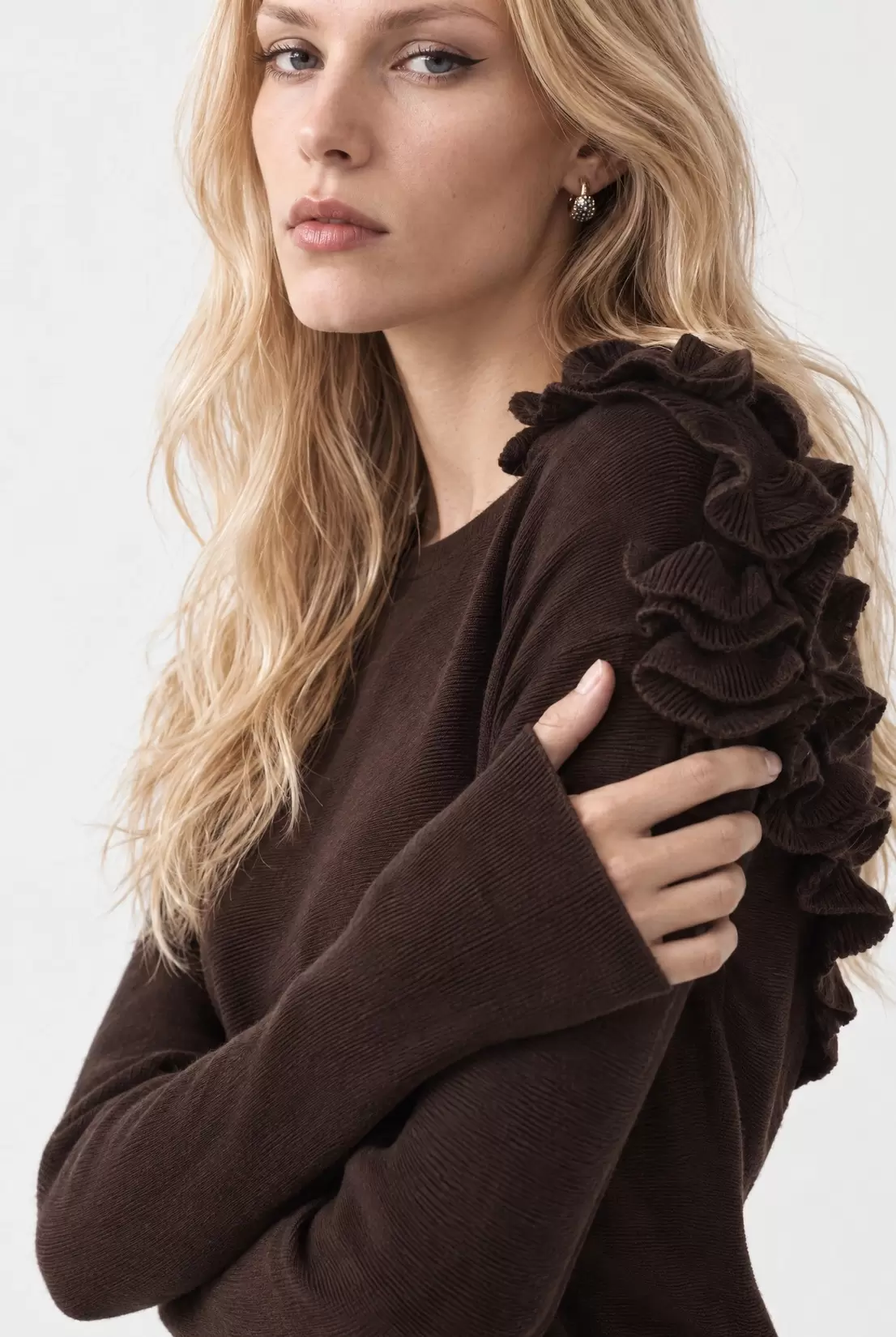 Knitted top with ruffles