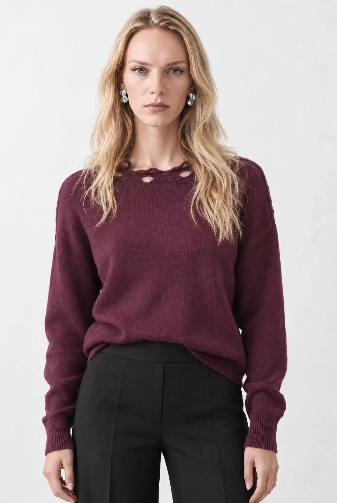 Knitted top with openwork details
